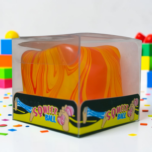 shopnathans.com Squishy Swirl Cube stress toy in orange and red marbled design inside a clear display box