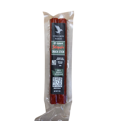 shopnathans.com Lone Crow Ranch all-natural jalapeno snack stick in a 2oz vacuum-sealed clear plastic package.