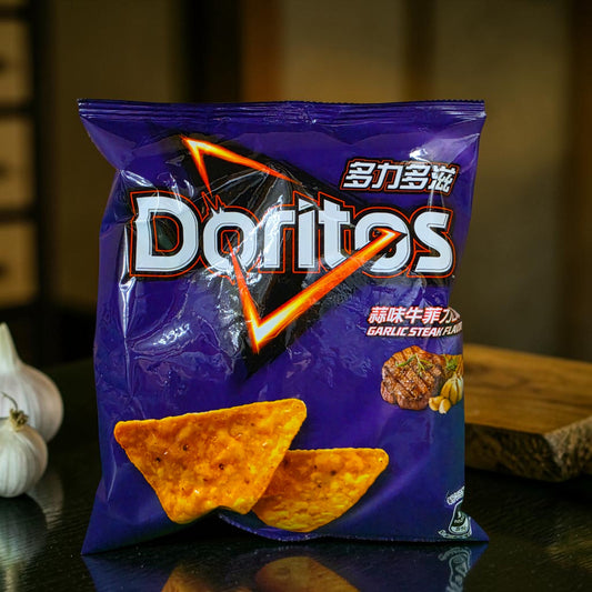 shopnathans.com Doritos Garlic Filet Steak flavored tortilla chips in a 40g purple snack bag