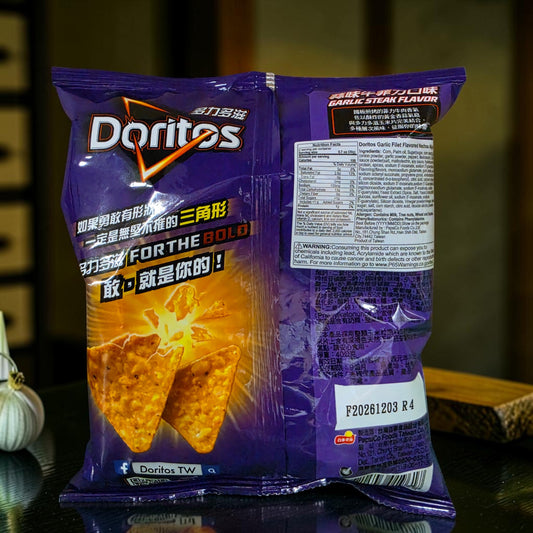 shopnathans.com Doritos Garlic Filet Steak flavored tortilla chips in a 40g purple snack bag with bold graphics