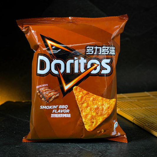 shopnathans.com Doritos Smokin BBQ flavor tortilla chips in a 68g brown bag with bold seasoning and smoky aroma
