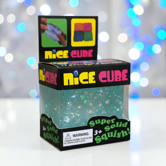 shopnathans.com squishy glitter cube stress toy in light blue with shimmering particles inside retail packaging