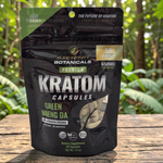 shopnathans.com Pure Infinity Botanicals Green Maeng Da Kratom capsules in a 50-count black pouch on a wooden surface.