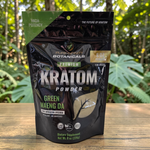 shopnathans.com Pure Infinity Botanicals Green Maeng Da Kratom powder in a black resealable 8oz bag outdoors.