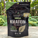shopnathans.com Pure Infinity Botanicals Green Maeng Da Kratom powder in a 2oz resealable black pouch outdoors.