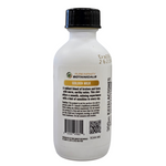 shopnathans.com Flow State Kava and Kratom Golden Milk shot bottle with turmeric and star anise on a wooden surface