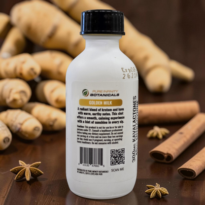 shopnathans.com Flow State Kava and Kratom Golden Milk shot bottle with turmeric and star anise on a wooden surface