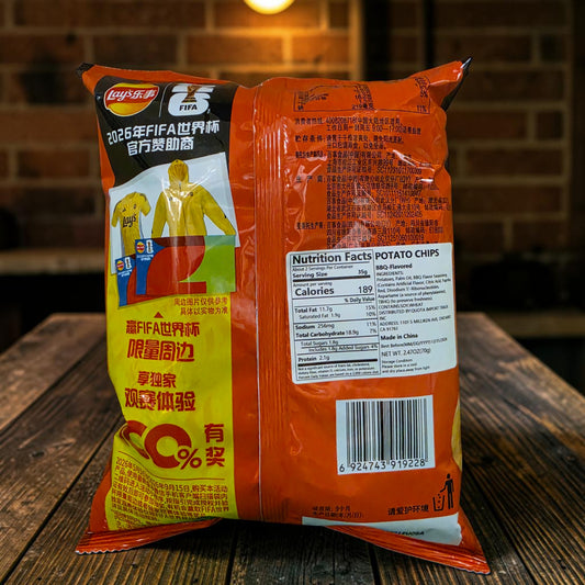 shopnathans.com Lay's Texas Grilled BBQ potato chips 70g bag back view with nutrition facts and FIFA promotion