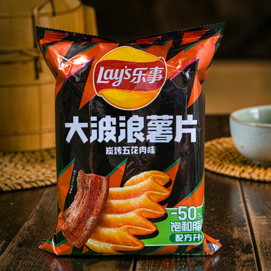 shopnathans.com Lay's Wavy Grilled Pork Belly flavor potato chips in a black and orange 70g snack bag