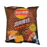 shopnathans.com Lay's Grilled Ribs wavy potato chips in a 34g snack bag with smoky barbecue rib imagery.