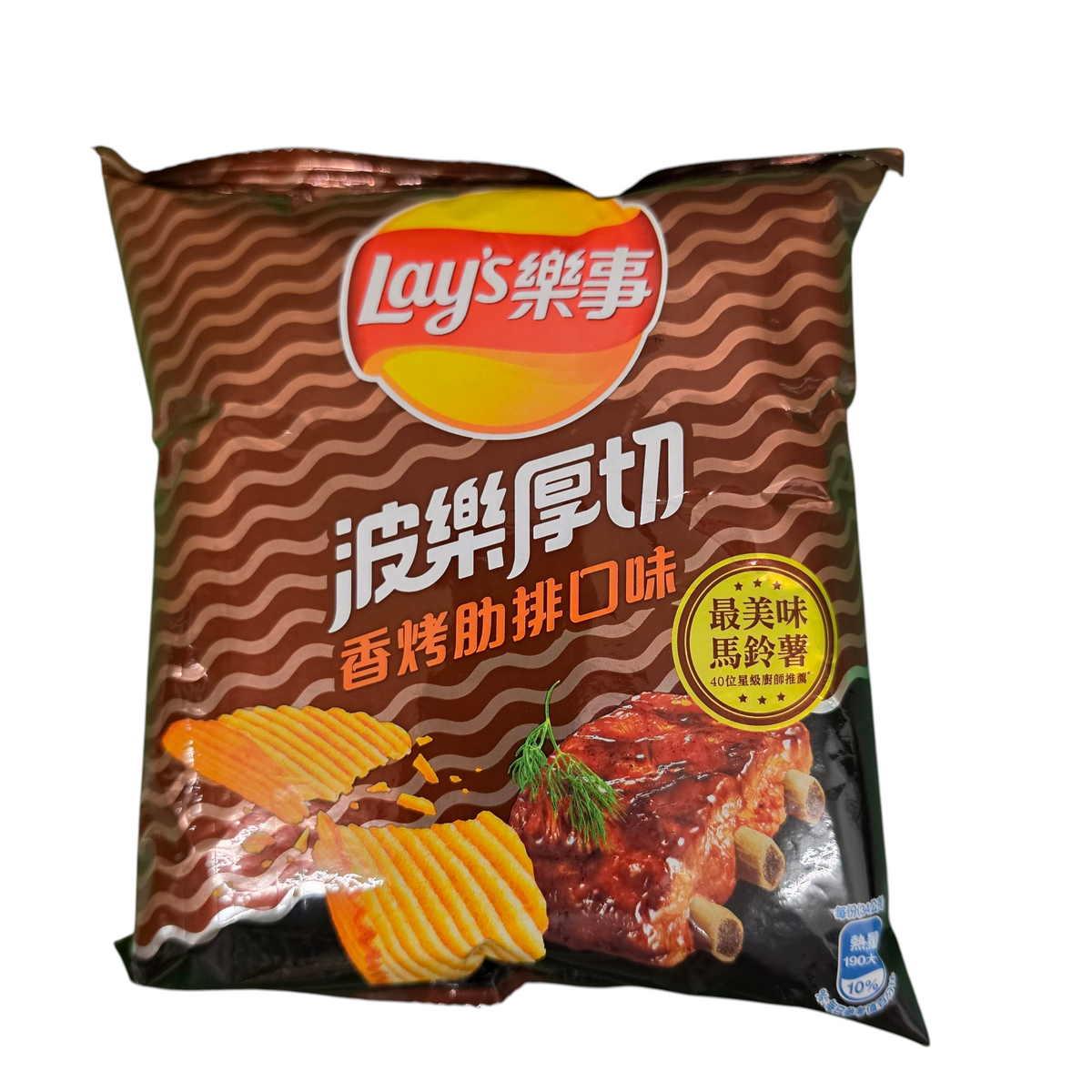 shopnathans.com Lay's Grilled Ribs wavy potato chips in a 34g snack bag with smoky barbecue rib imagery.