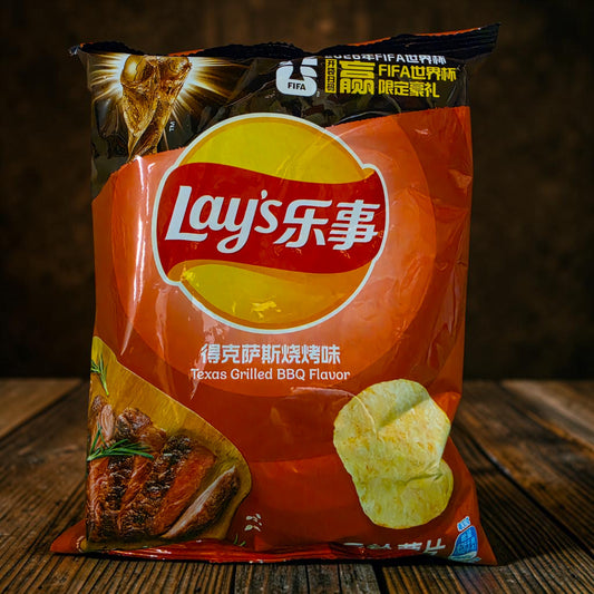 shopnathans.com Lay's Texas Grilled BBQ flavor potato chips in a 70g bag with smoky barbecue imagery