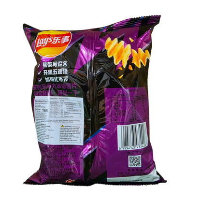 shopnathans.com Lay's Wavy Spicy Noodle Ramen flavor potato chips in a 70g purple and black snack bag