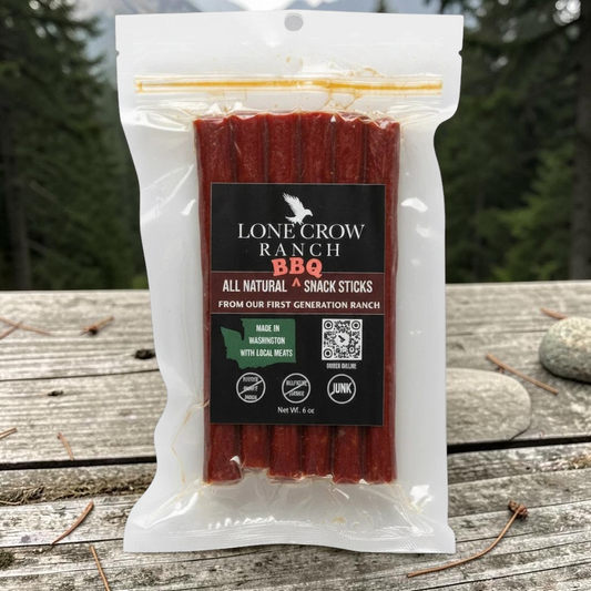 shopnathans.com Lone Crow Ranch BBQ all-natural meat sticks in a 6oz resealable pouch on a rustic outdoor table