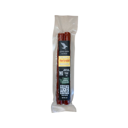 shopnathans.com Lone Crow Teriyaki snack stick in clear vacuum-sealed packaging with black and white label