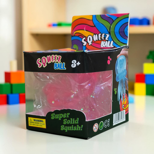 shopnathans.com pink glittery squishy jellyfish sensory toy in its retail box on a white surface