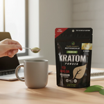 shopnathans.com Pure Infinity Botanicals Red Maeng Da Kratom powder in a resealable pouch with a scoop over a mug
