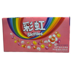shopnathans.com Skittles Flowery Fruity flavor candy box with rainbow branding and fresh strawberries on marble table