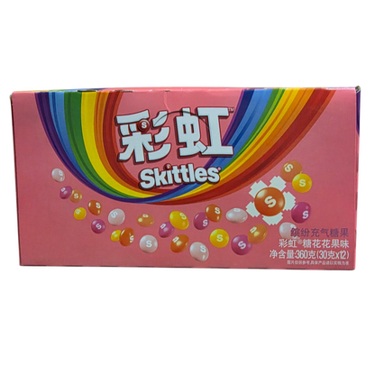 shopnathans.com Skittles Flowery Fruity flavor candy box with rainbow branding and fresh strawberries on marble table