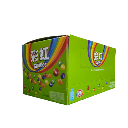 shopnathans.com Skittles Sour fruit candy display box in vibrant green with rainbow branding and colorful candy graphics