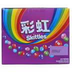 shopnathans.com Skittles Wild Berry candy box with vibrant purple packaging and colorful rainbow graphic design