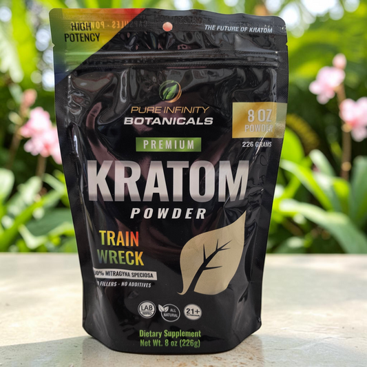shopnathans.com Pure Infinity Botanicals Trainwreck Kratom Powder in an 8oz resealable black pouch outdoors.